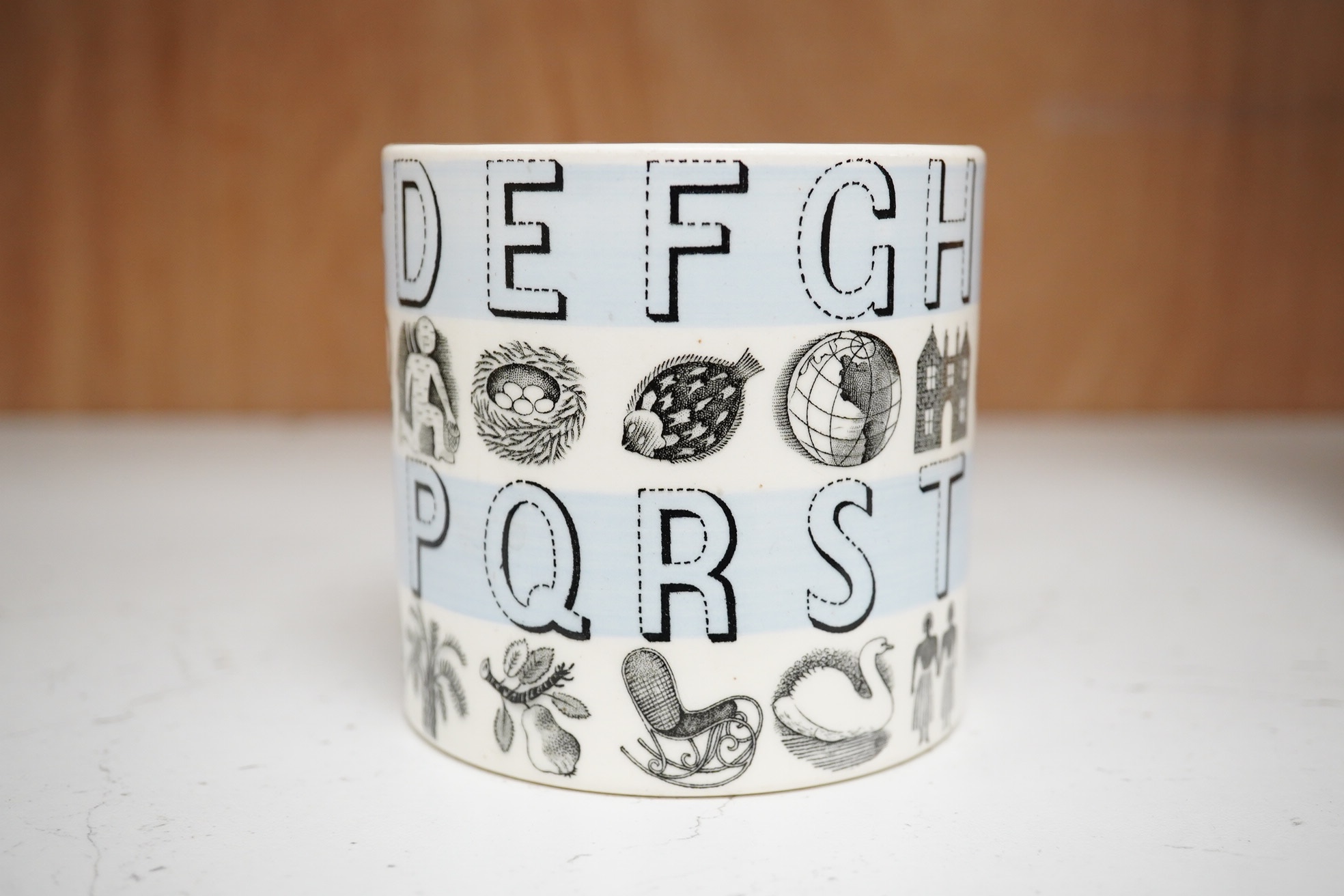 Eric Ravilious for Wedgwood, an 'Alphabet' mug, 8cm high. Condition - fair